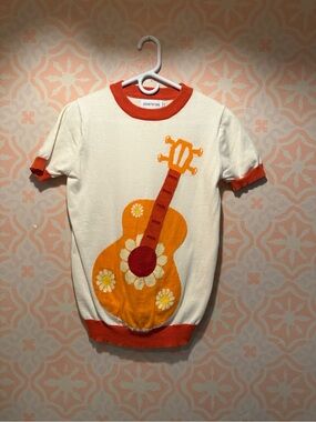 Cream Short-Sleeve Knit Tee with Orange Guitar Motif